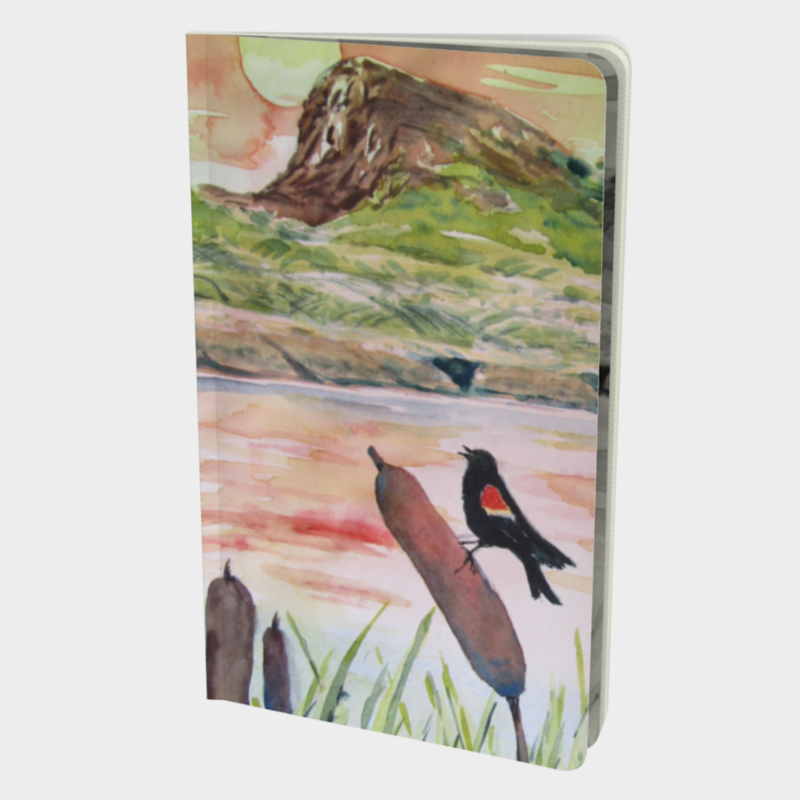 Front cover of notebook depicting print of watercolour painting of Giant&#39;s Head Mountain and meadowlark