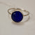 Sterling silver ring with blue cabuchon stone