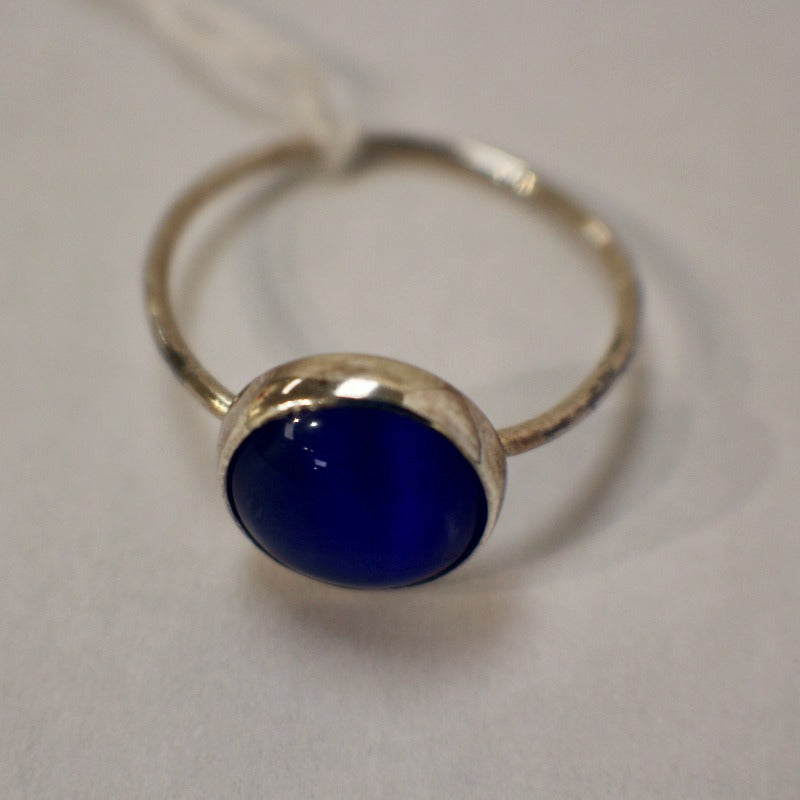 Sterling silver ring with blue cabuchon stone