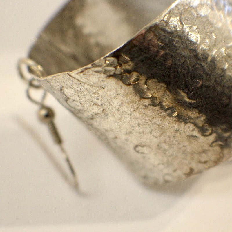 Detail of sterling silver tube earring