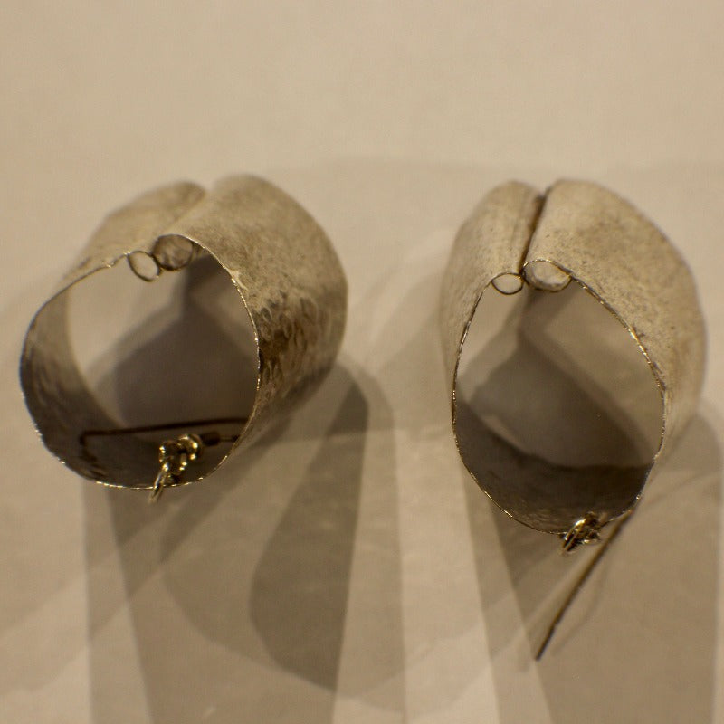 Top view of sterling silver tube earrings
