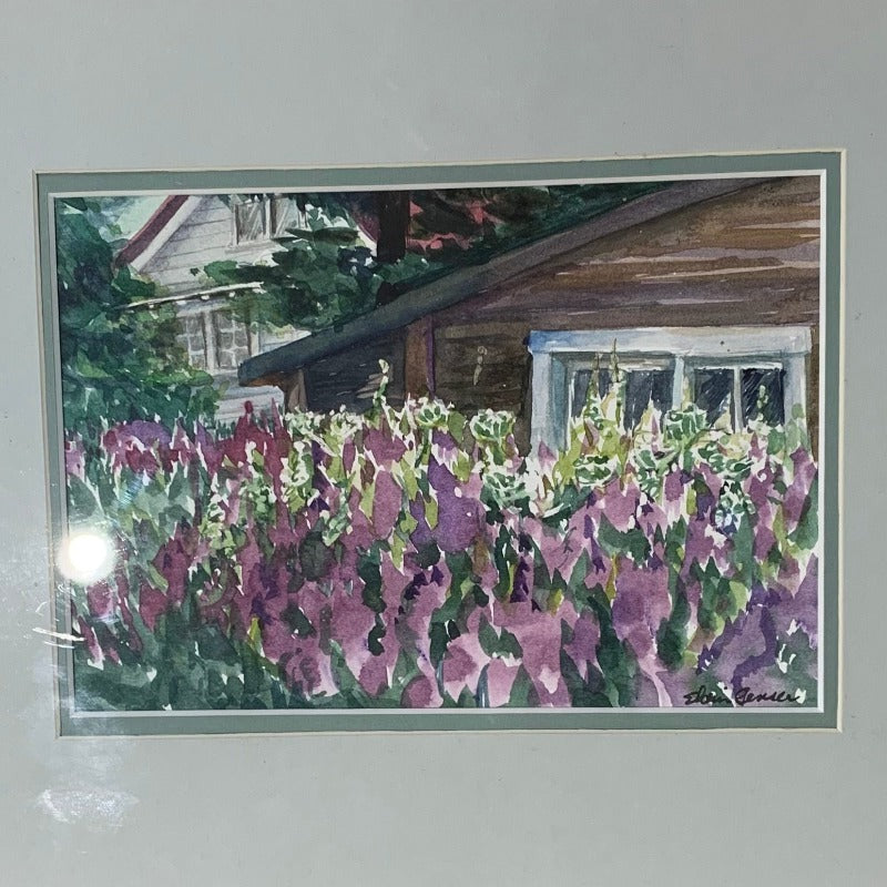 Watercolour of log cabin surrounded by purple flowers