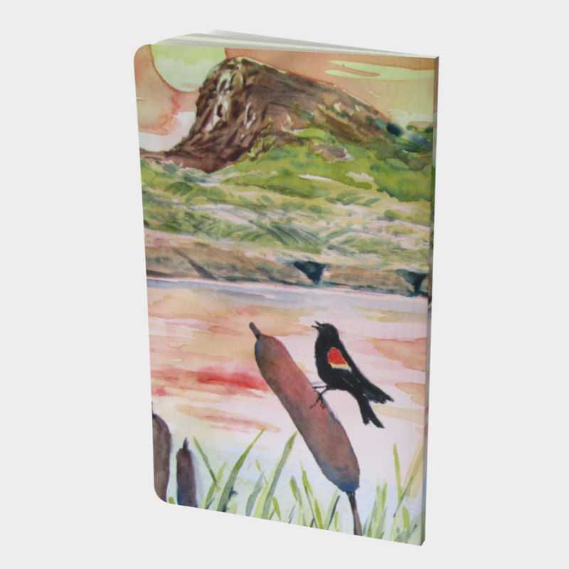 Back cover of notebook depicting print of watercolour painting of Giant&#39;s Head Mountain and meadowlark