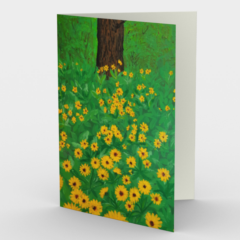 Greeting card depicting print of a watercolour of a tree trunk surrounded by grass and yellow flowers