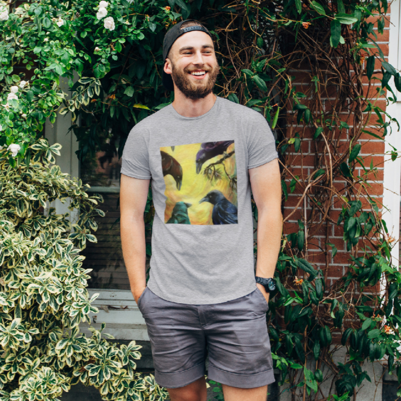 Man wearing grey tshirt with decal featuring 4 crows