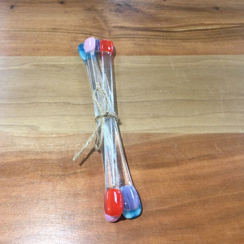 Set of 4 glass swizzle sticks tied together with twine